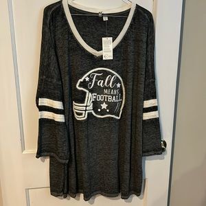 Football dress/long shirt is perfect for game day! Raised detailing on the front